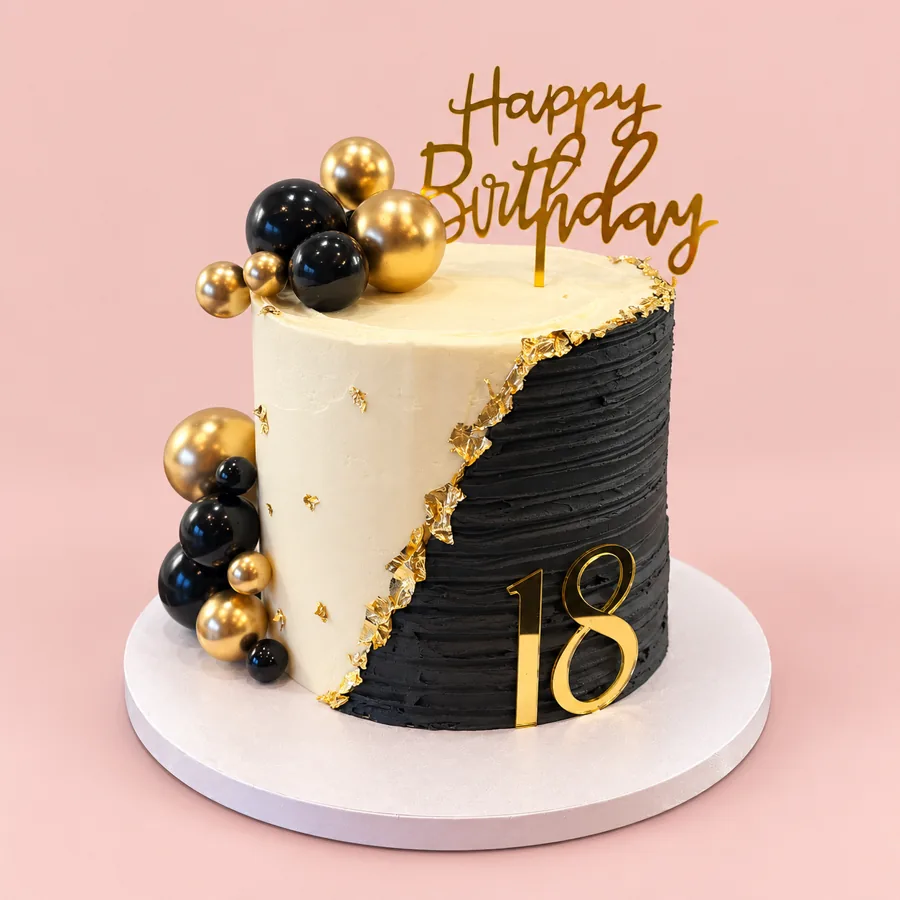 Custom black, ivory and gold celebration cake